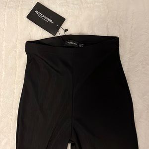 black ribbed flared trousers, pretty little thing, size 2, black